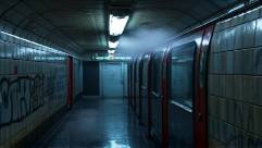 attentive biohazard cleanup, thorough, cleansing surfaces, photorealistic, in a contaminated subway with graffiti, highly detailed, steam from vents, dynamic contrast, gritty blacks and reds, subdued neon lights, shot with a 45mm lens.